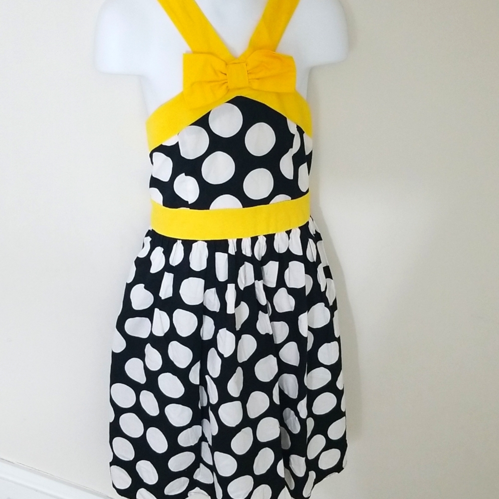 A disorderly polka dot patterned dress.